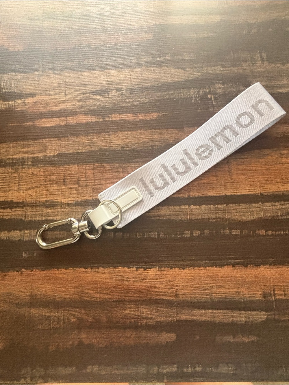 Lululemon White Logo Wristlet Keychain 
New. Never used.